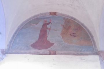 L'affresco raffigurante San Giulio sotto al portico dell'oratorio
